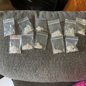 11 pieces of Silver Small/Medium Bracelets.  Brand New